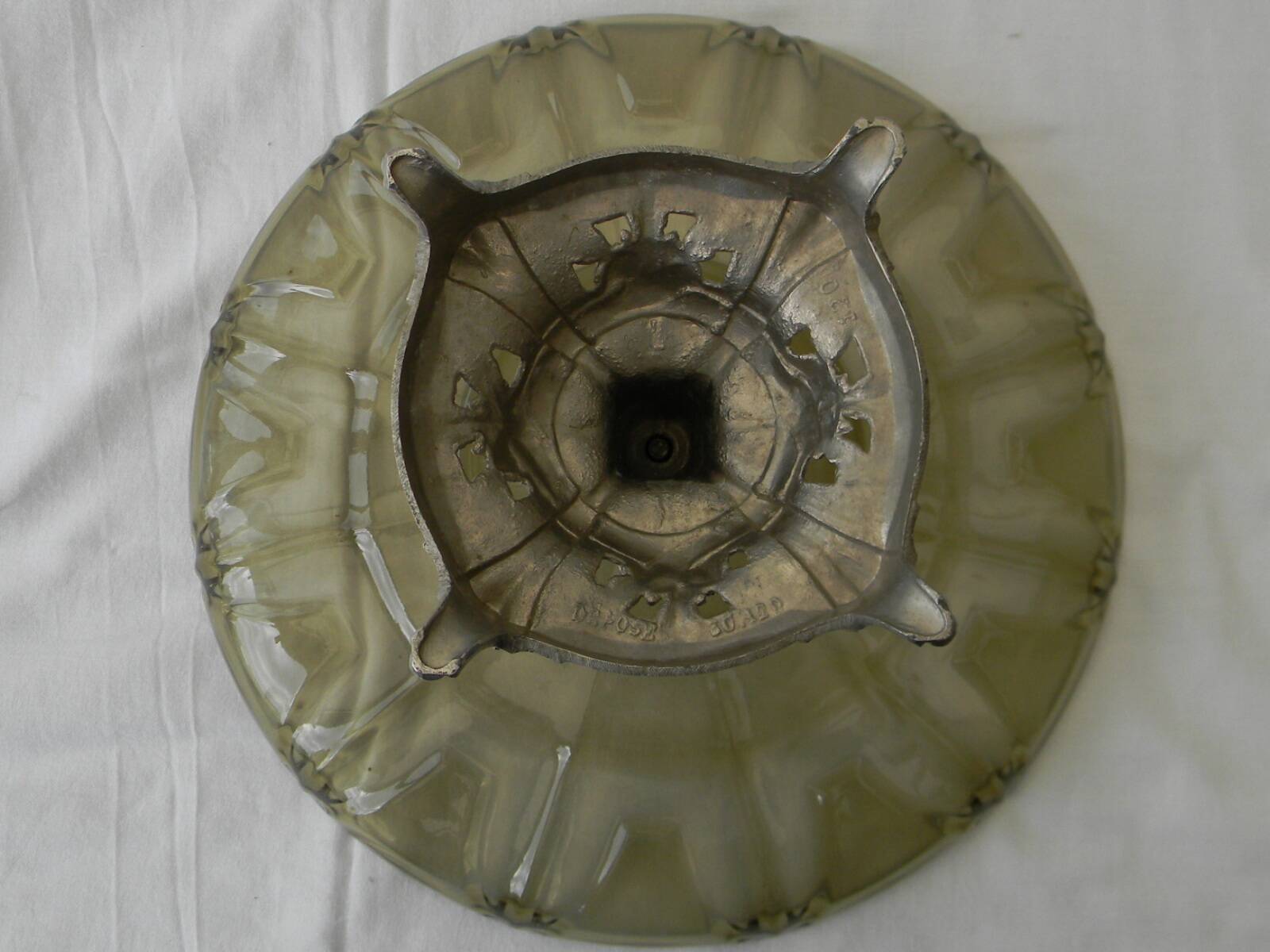 Large smoked glass fruit bowl with a metal base.