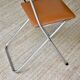 Pair of “Soudexvinyl” folding chairs in skai and chrome tube