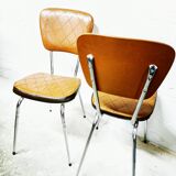 Pair of chrome and skai chairs