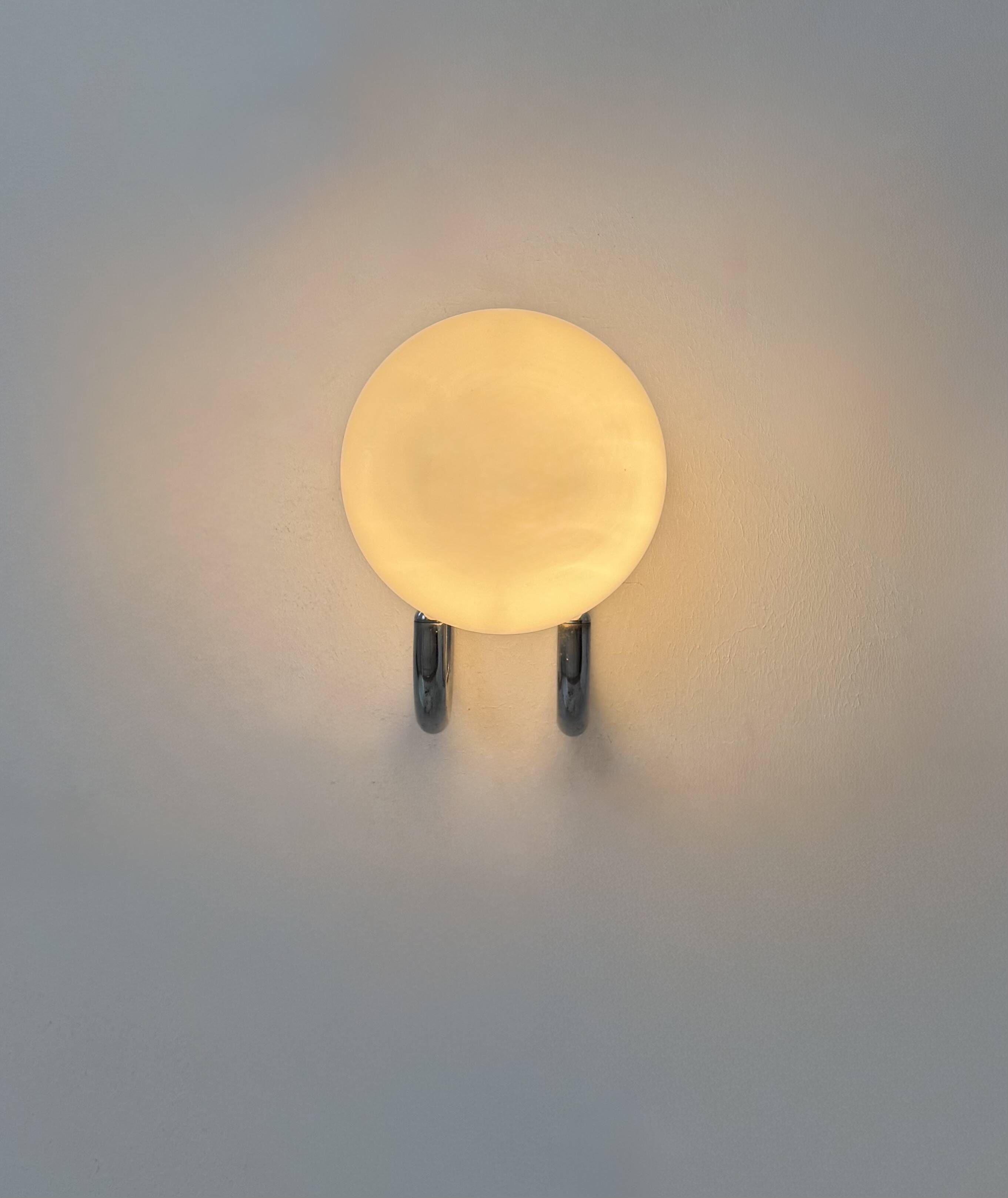 Pair of vintage wall lights, chrome metal and opaline, France, 1960.
