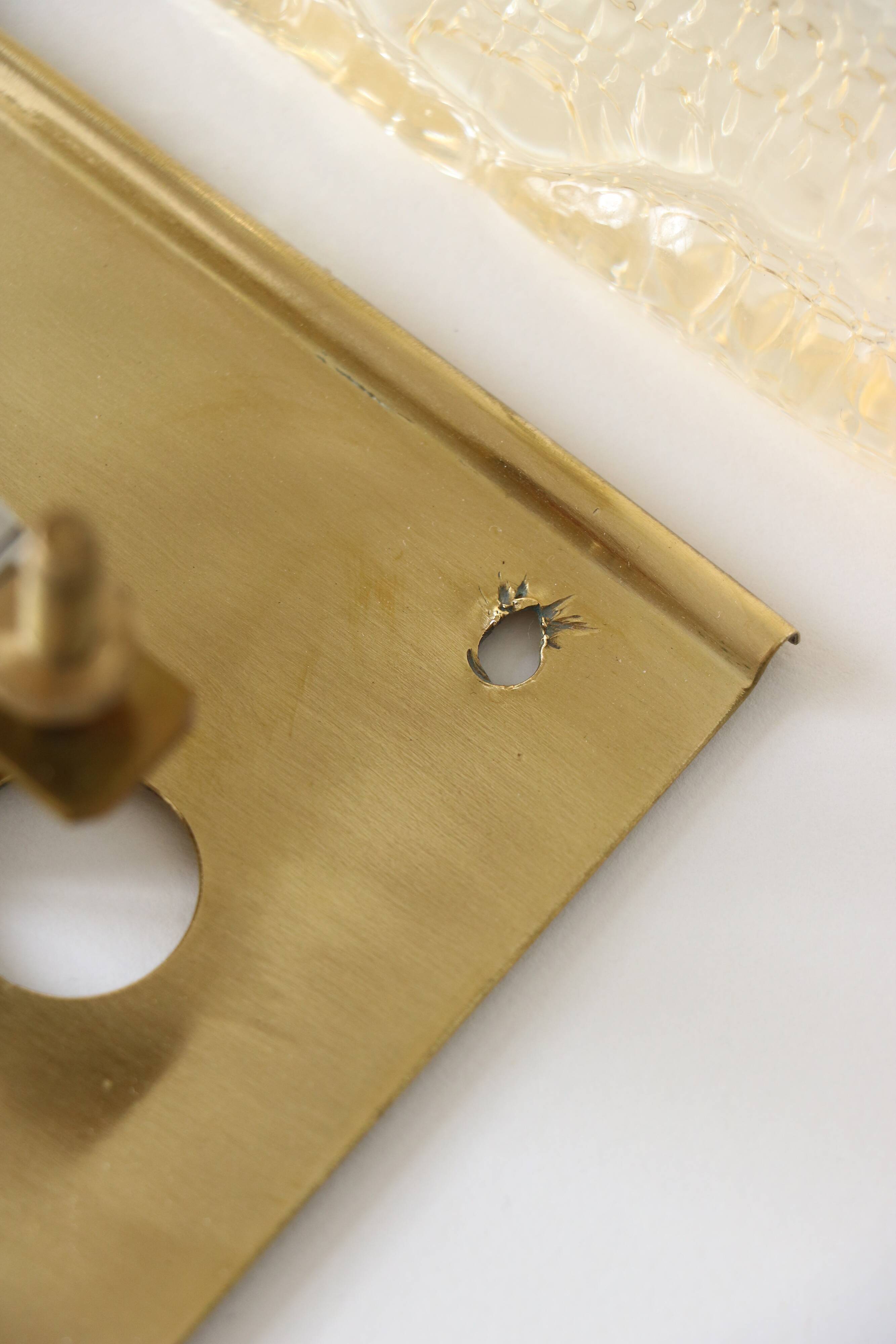 Glass and brass wall light by Carl Fagerlund for Orrefors, 1960.