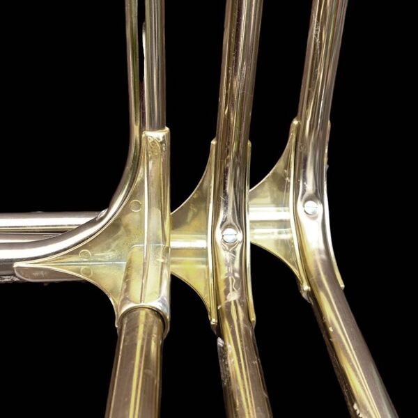 Trio de tables gigognes dorées, verre fumé safety glass, années 70