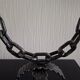 Brutalist double candle chandelier—wrought iron, chain and tripod base