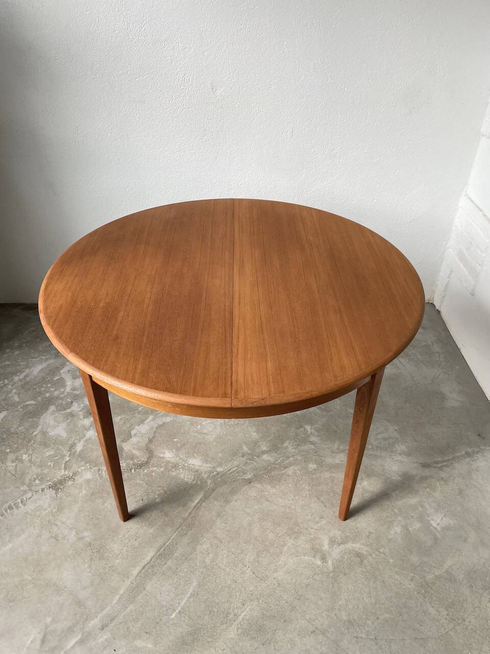 Scandinavian round teak table with extension