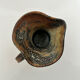 Patinated stoneware jug