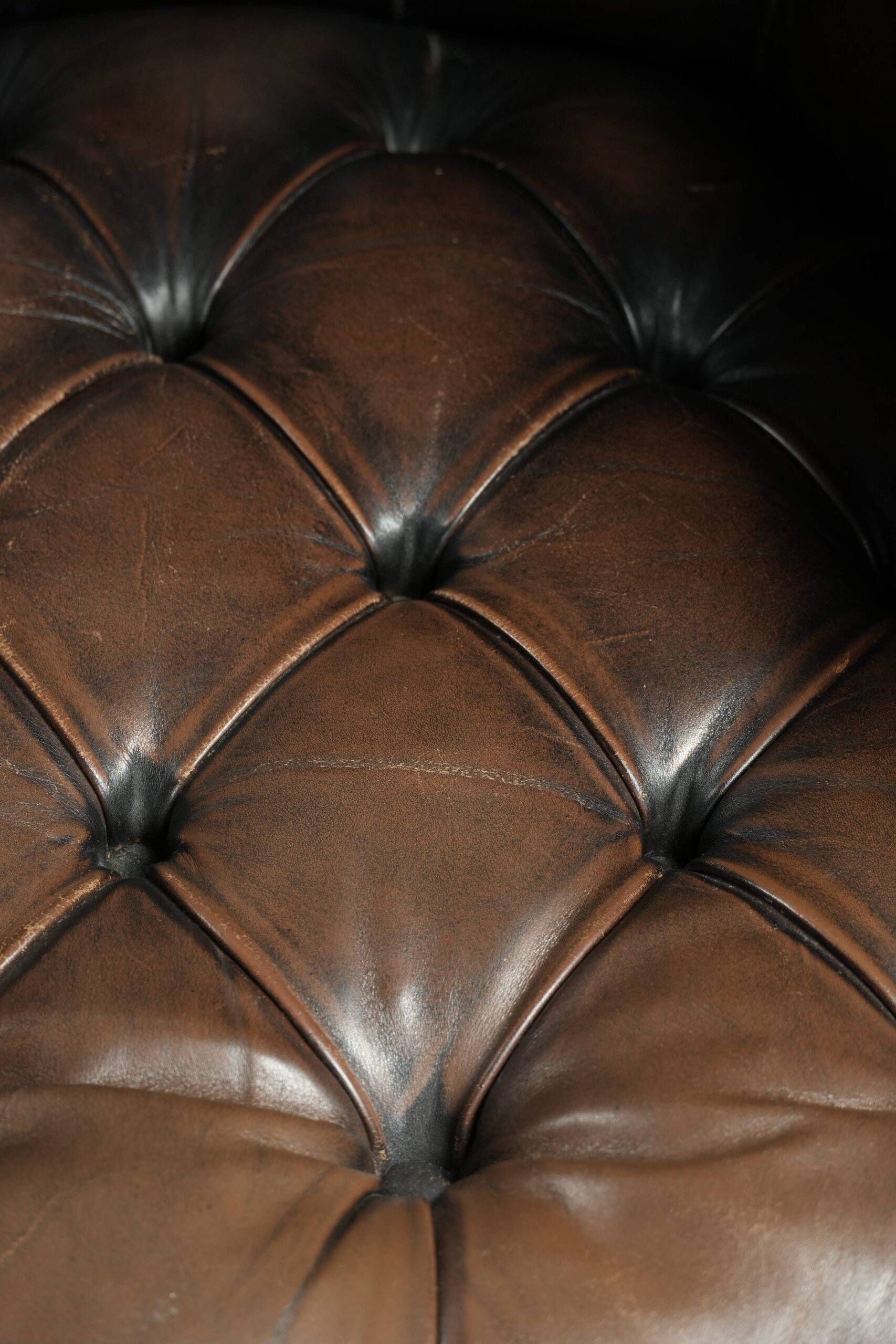 Vintage Chesterfield office chair with decorative nails in English style