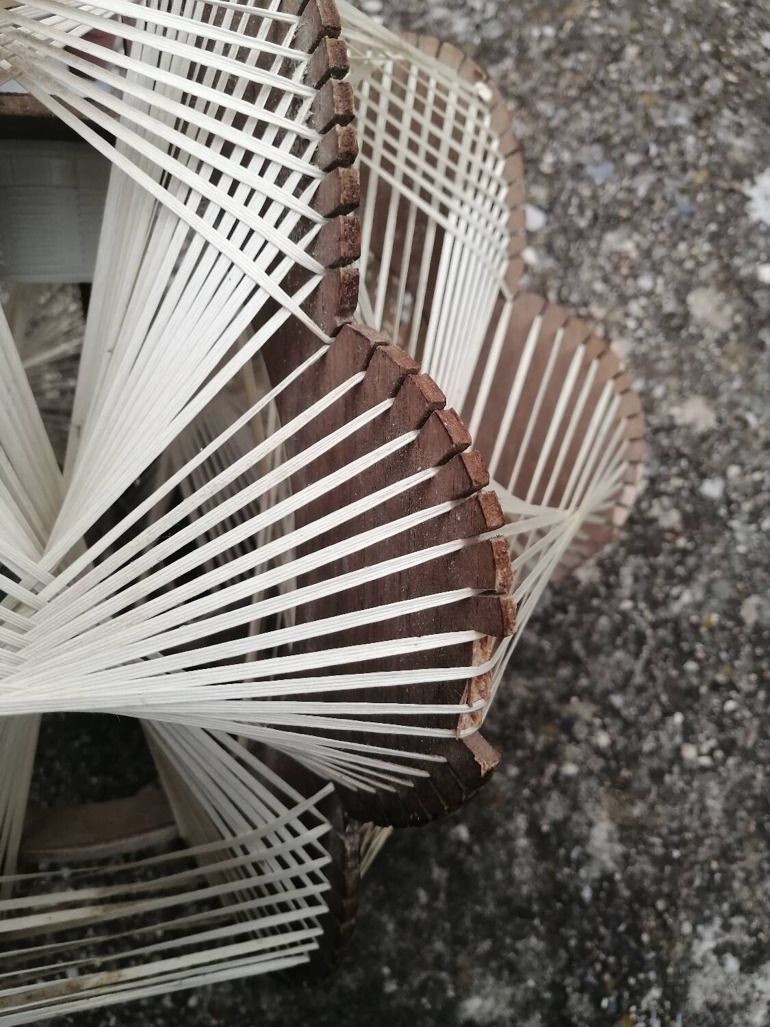 Pair of vintage wooden and rattan straw pendant lights.
