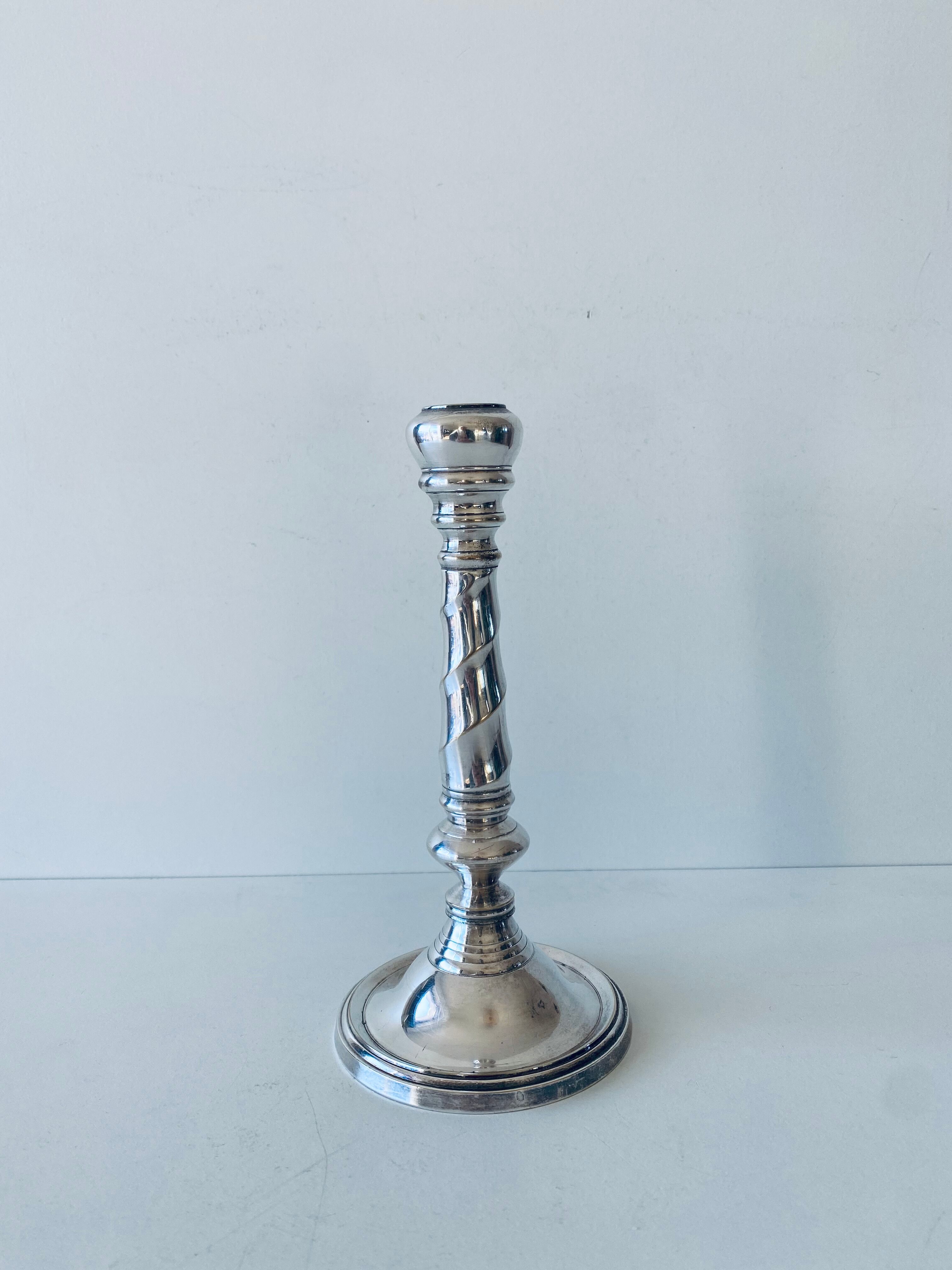 Twisted silver candle holder