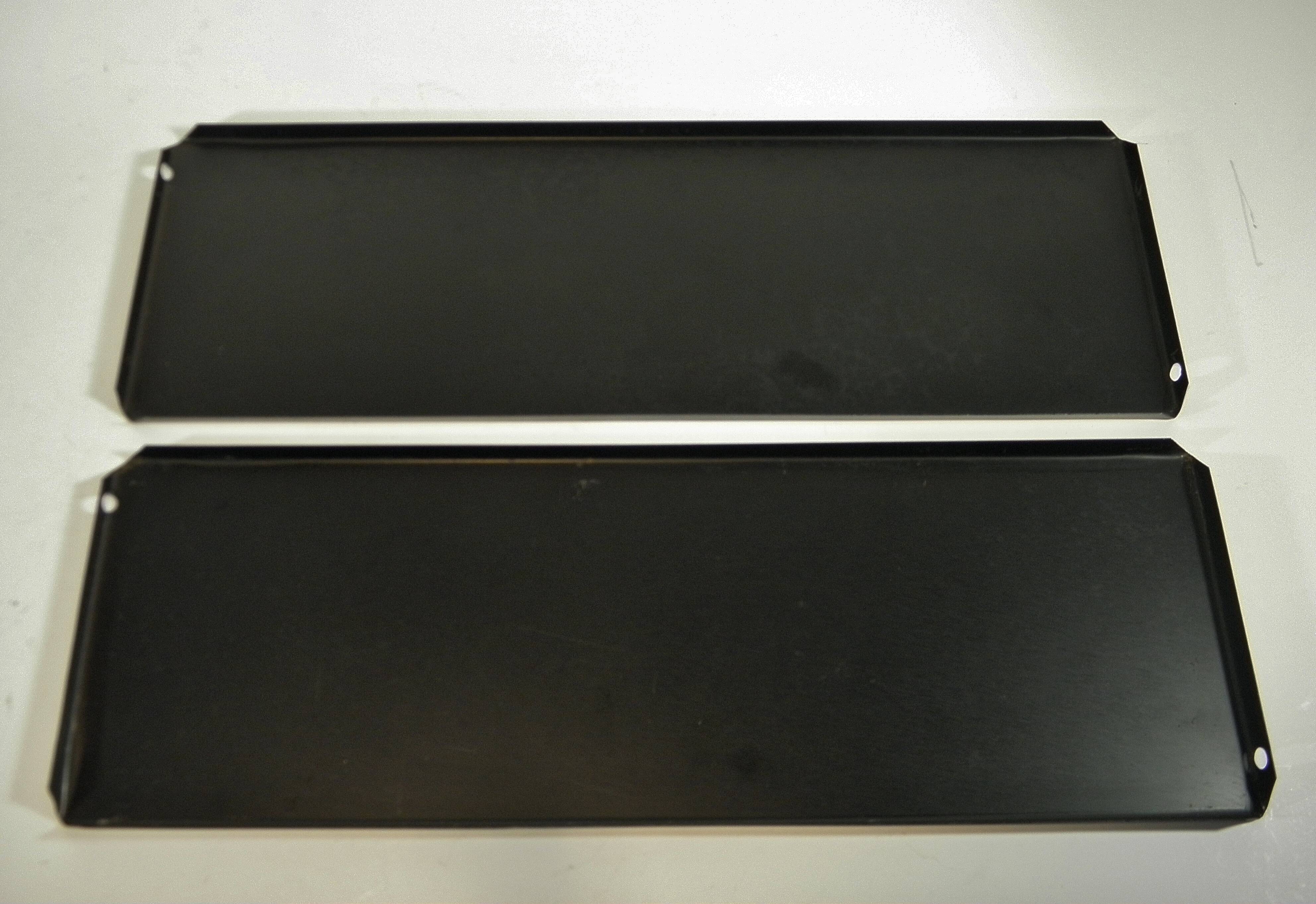 Black and gold metal wall shelf from the 1960s