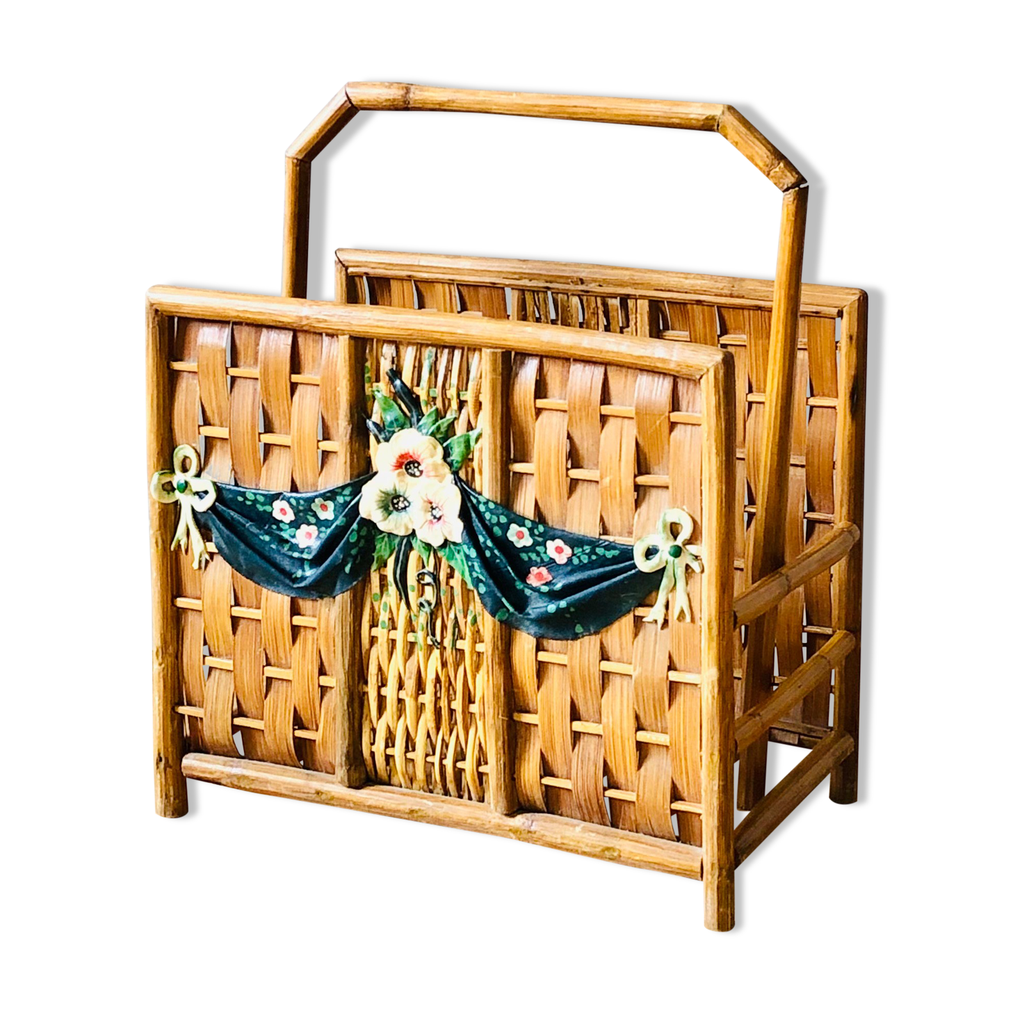 Vintage rattan magazine holder with floral decoration