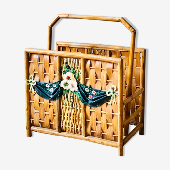 Vintage rattan magazine holder with floral decoration