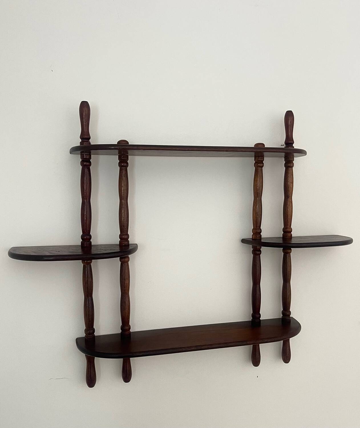 Turned wood wall shelf