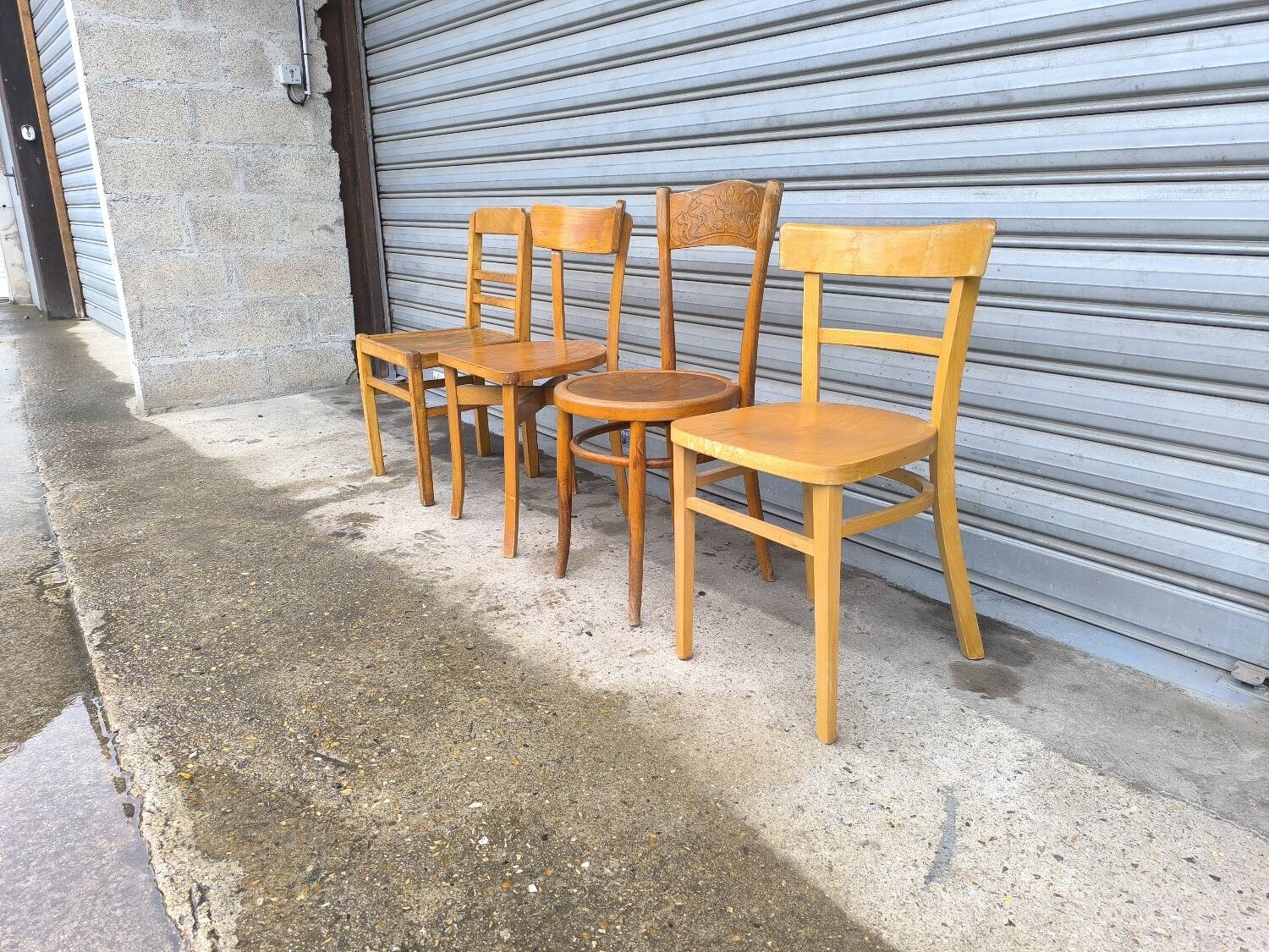 Set of four mismatched bistro chairs
