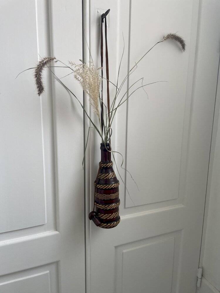 Leather-covered bottle