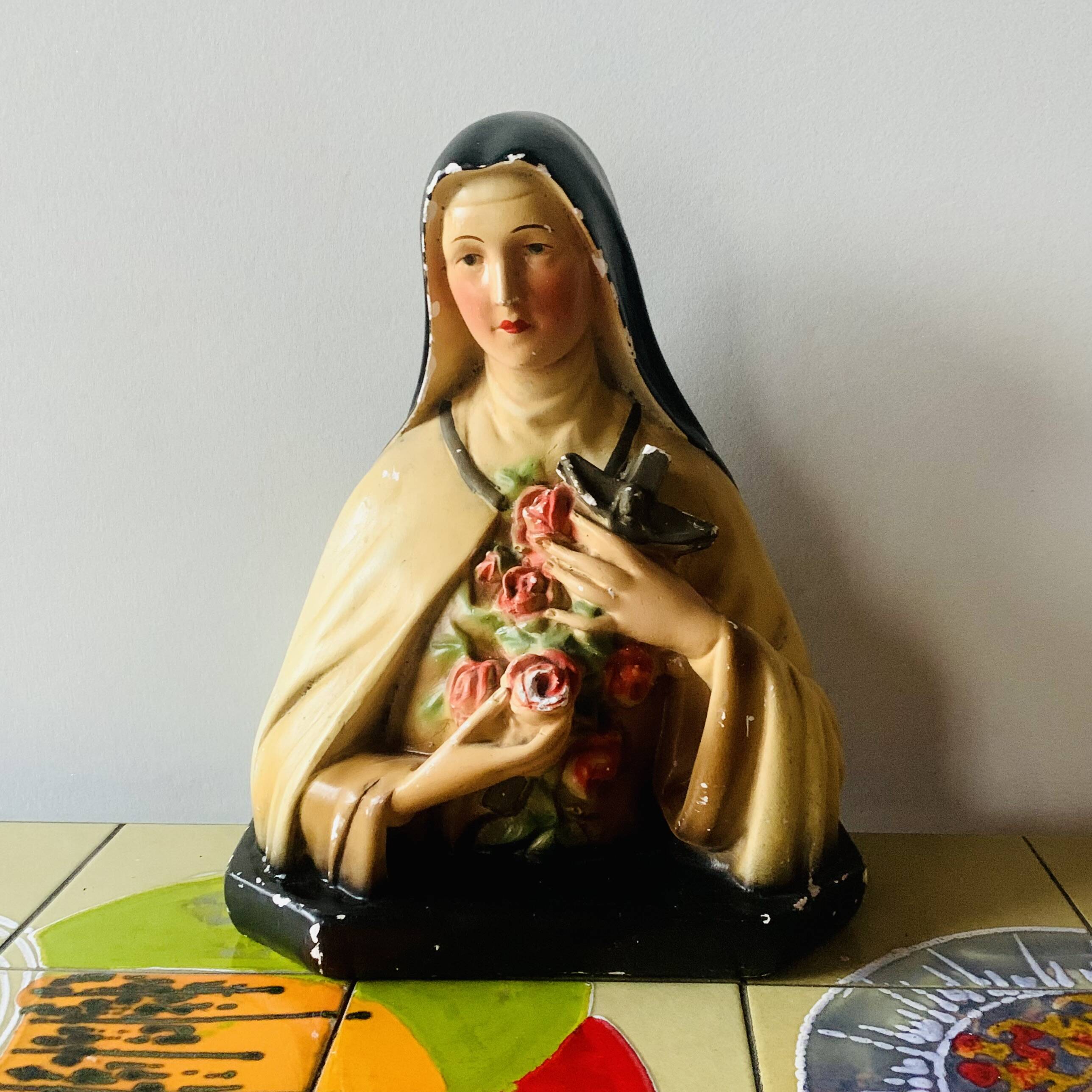 Old plaster bust of Saint Thérèse of Lisieux