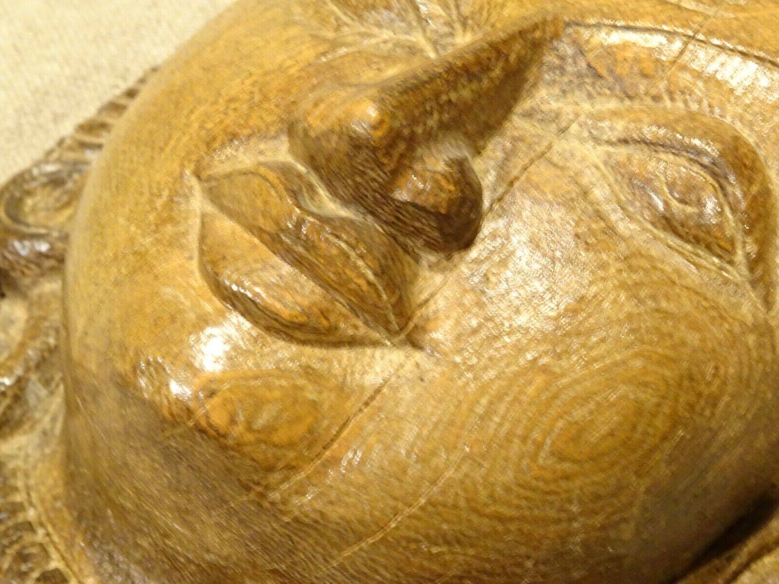 Hindu Shiva mask head wooden sculpture?