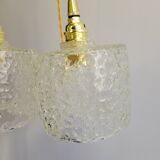 Trio of scrambled glass pendant lamps