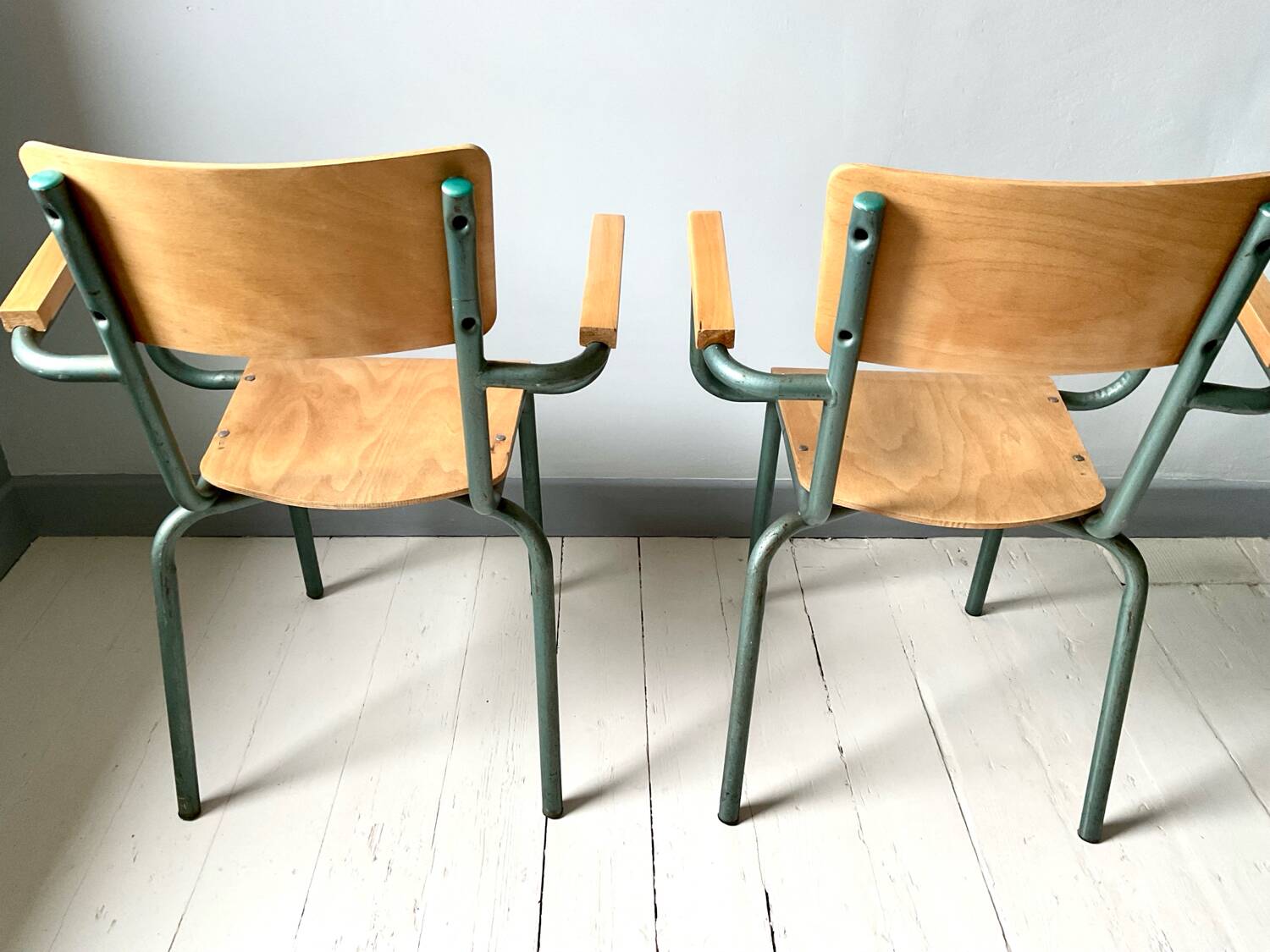 Set of four school teacher armchairs