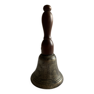 Liturgical bell in bronze and wood