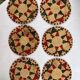 Round coaster made of natural wicker rattan, red and green