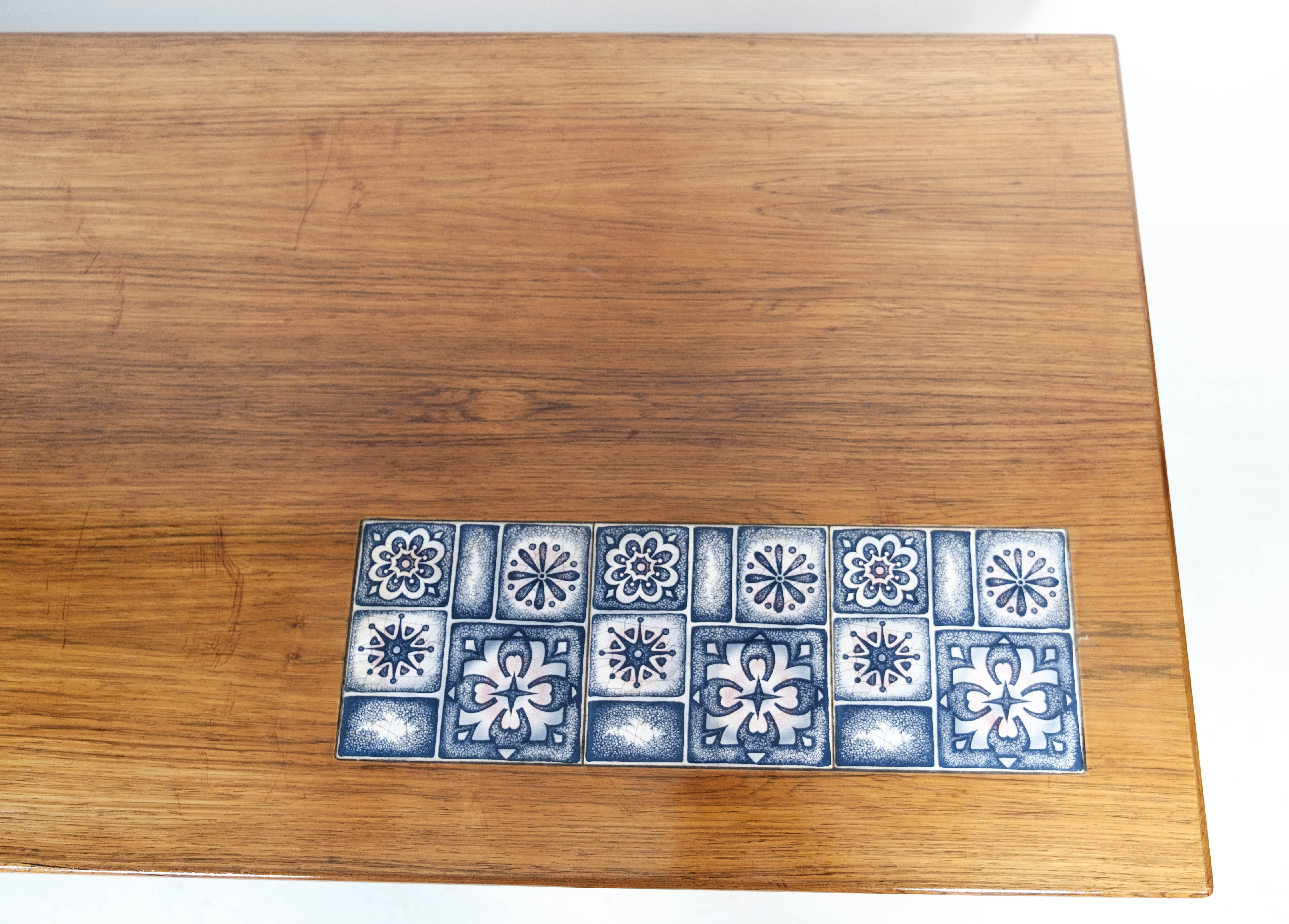 Coffee table in rosewood with blue tiles designed by Johannes Andersen, 1960s