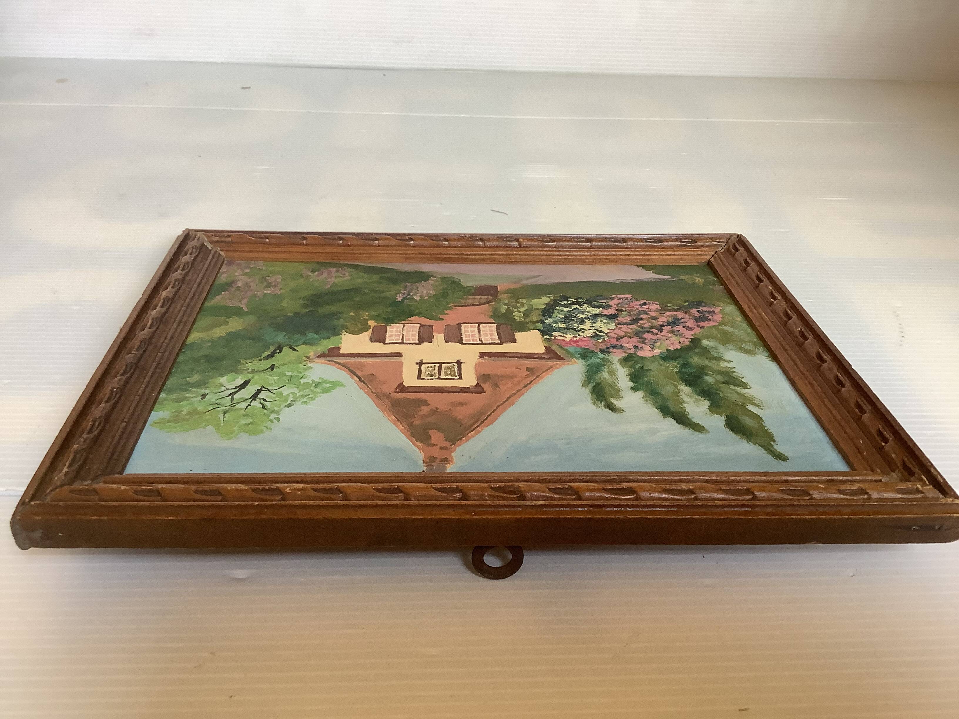 Small painting of a flowered house in oil on cardboard.