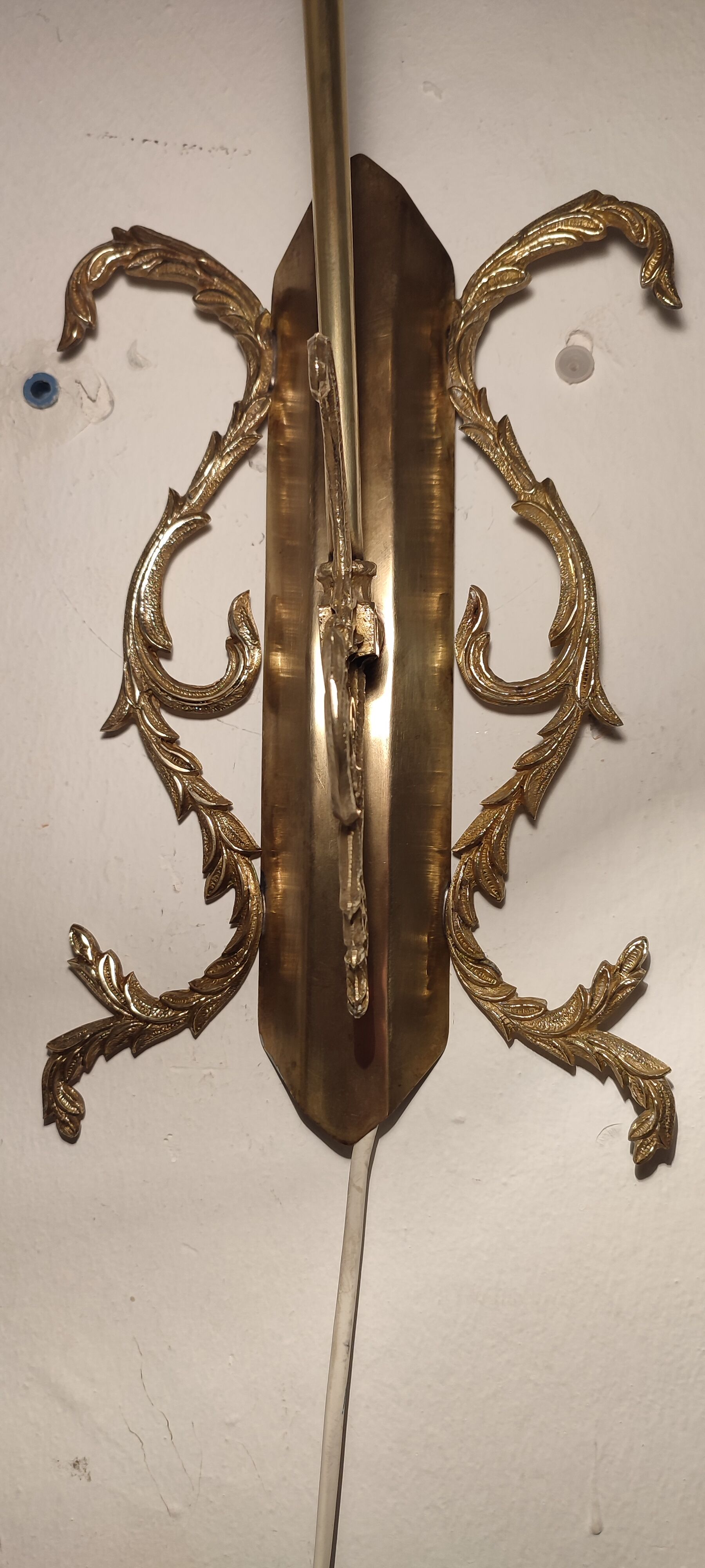 Bronze Modernist wall lamp. Spain, 1930s.