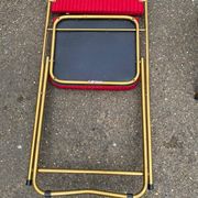 2 folding opera chairs Lafuma France 1970 in gold and burgundy.