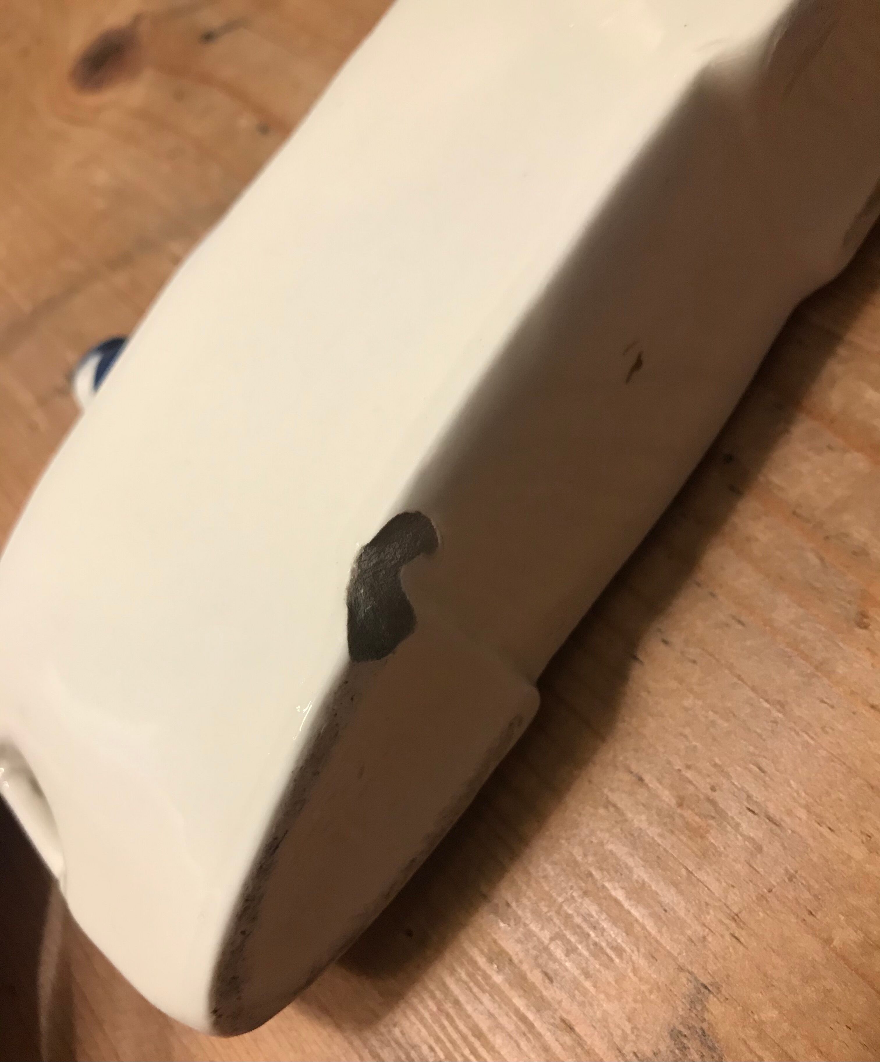 Letter door in earthenware topped with a peacock