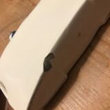 Letter door in earthenware topped with a peacock