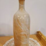 Bouteille fleurie en grès émaillé