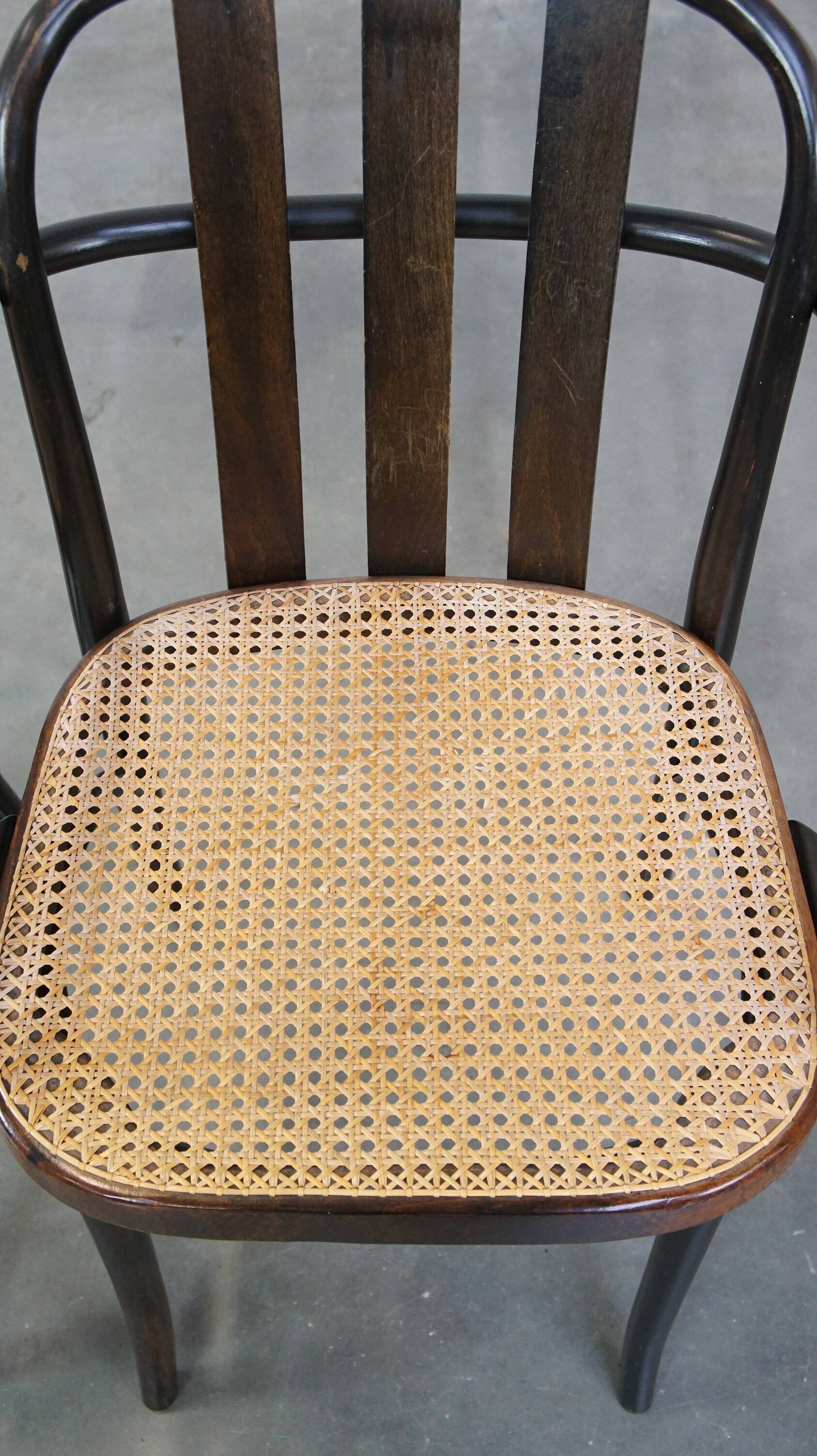 Set of 2 vintage wooden design dining/bistro chairs with woven seats