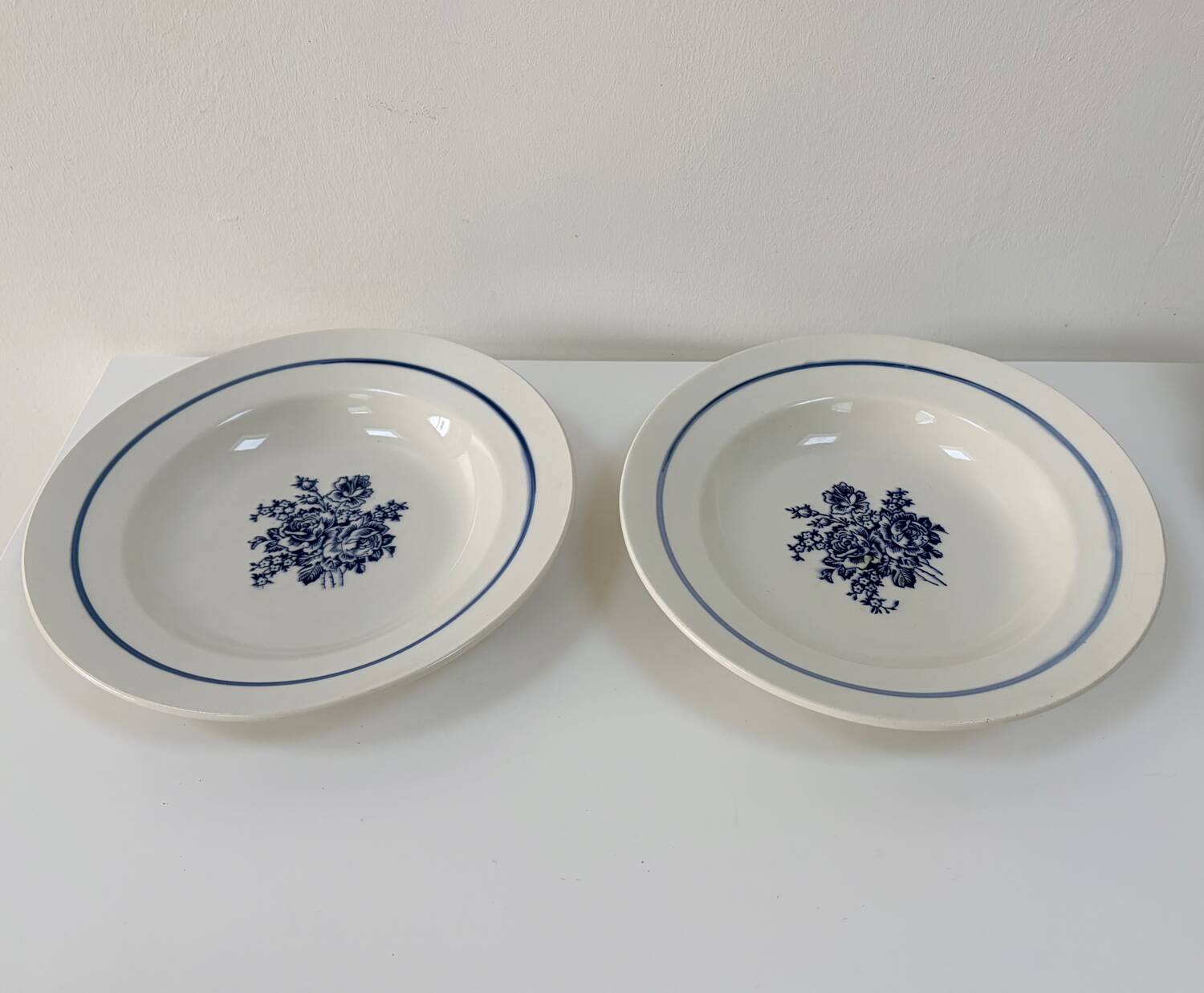 Pair of old hollow plates in earthenware