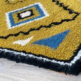 Tapis  vintage en laine jaune ocre Smyrna 97x50cm