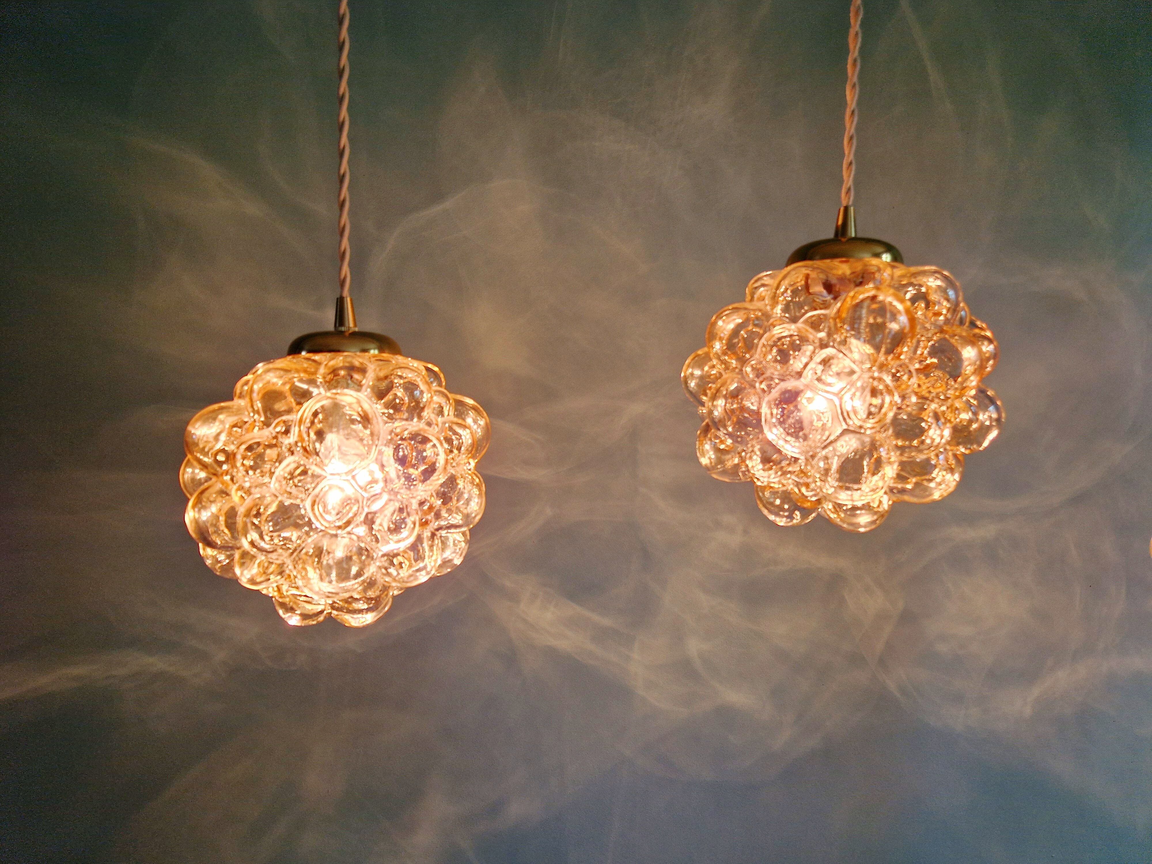 Amber bubble glass pendant (3 available), design by Helena Tynell, 1970.
