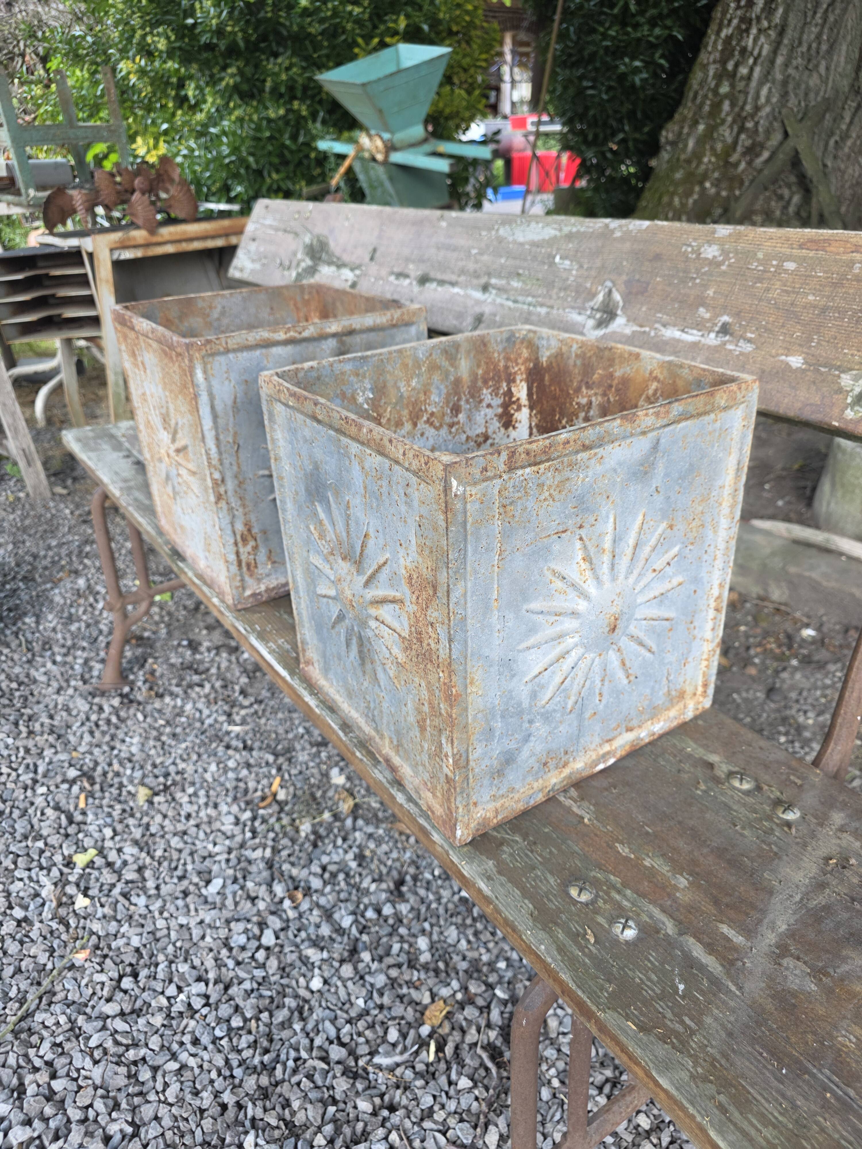 Pair of cast iron planters