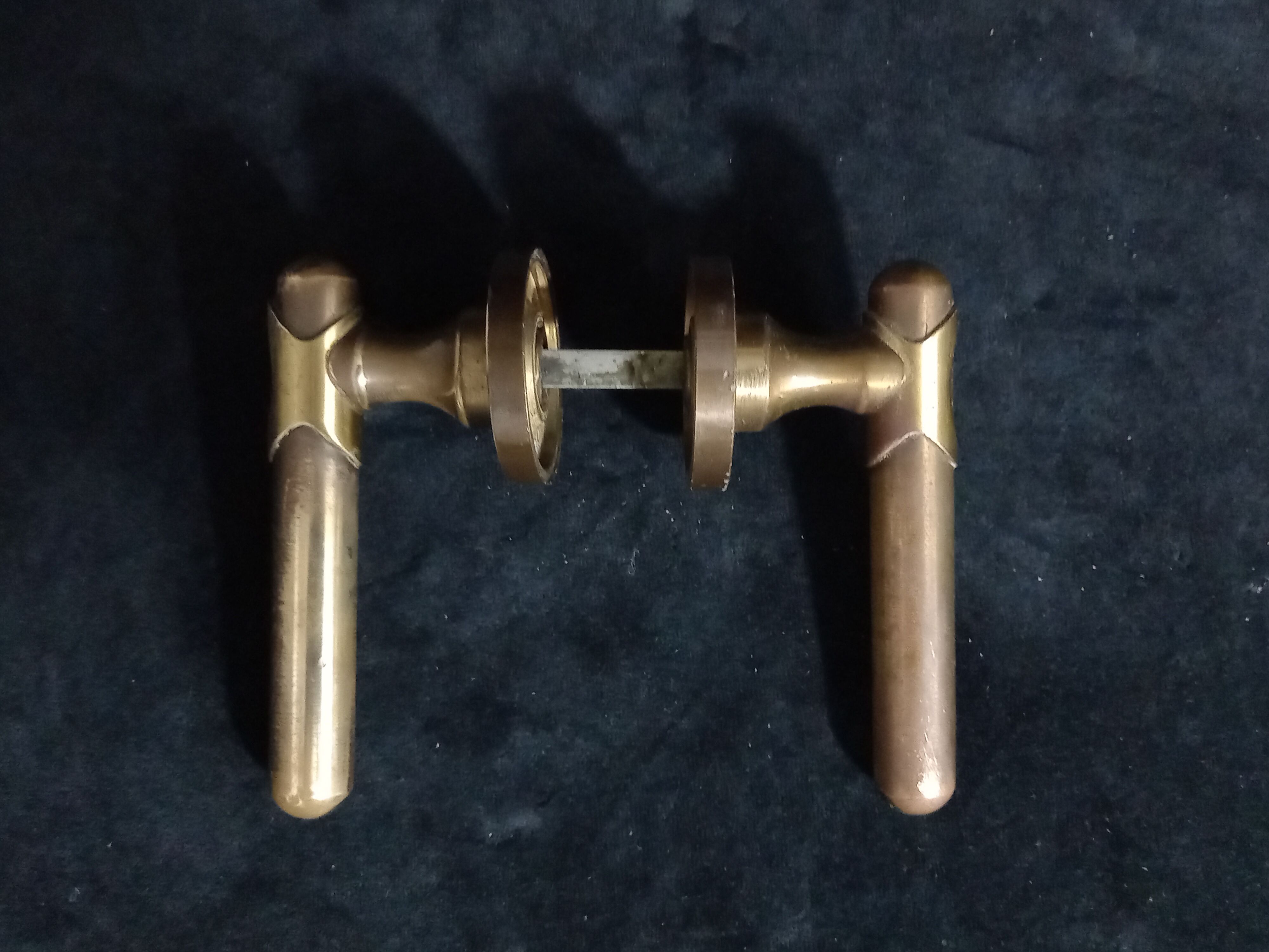 Four pairs of brass door handles with key plates