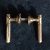Four pairs of brass door handles with key plates