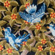Tableau ancien brodé oiseaux bleus et fleurs - tapisserie encadrée
