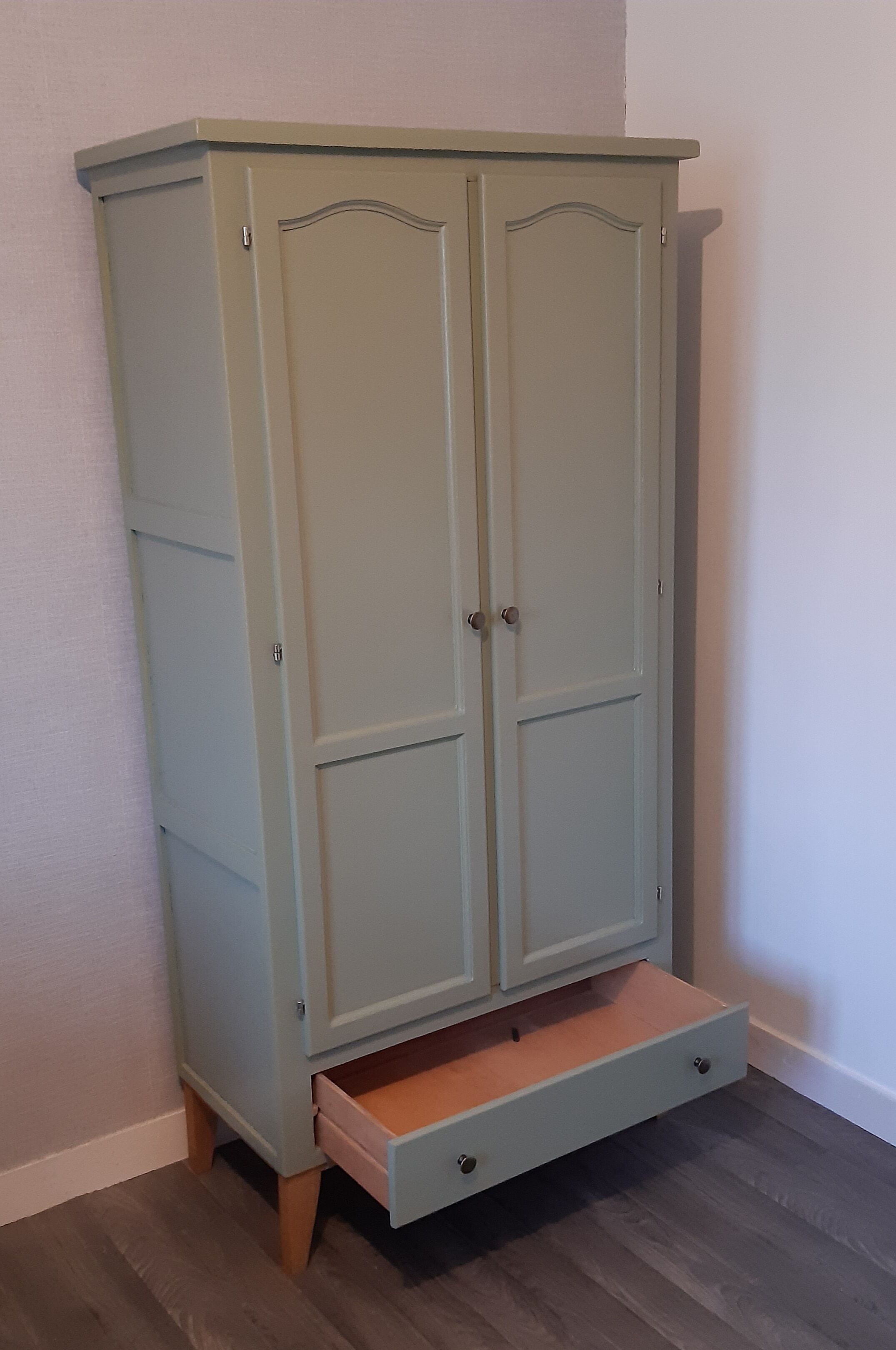 Scandinavian forest green wardrobe