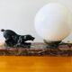 Lampe Art déco globe en opaline blanche et chien de chasse