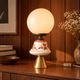 Carrie — Table lamp in white opal, floral ceramic and gilded brass.