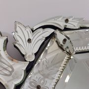 Venetian wall mirror in Murano glass with faceted floral decoration from the 1930s.