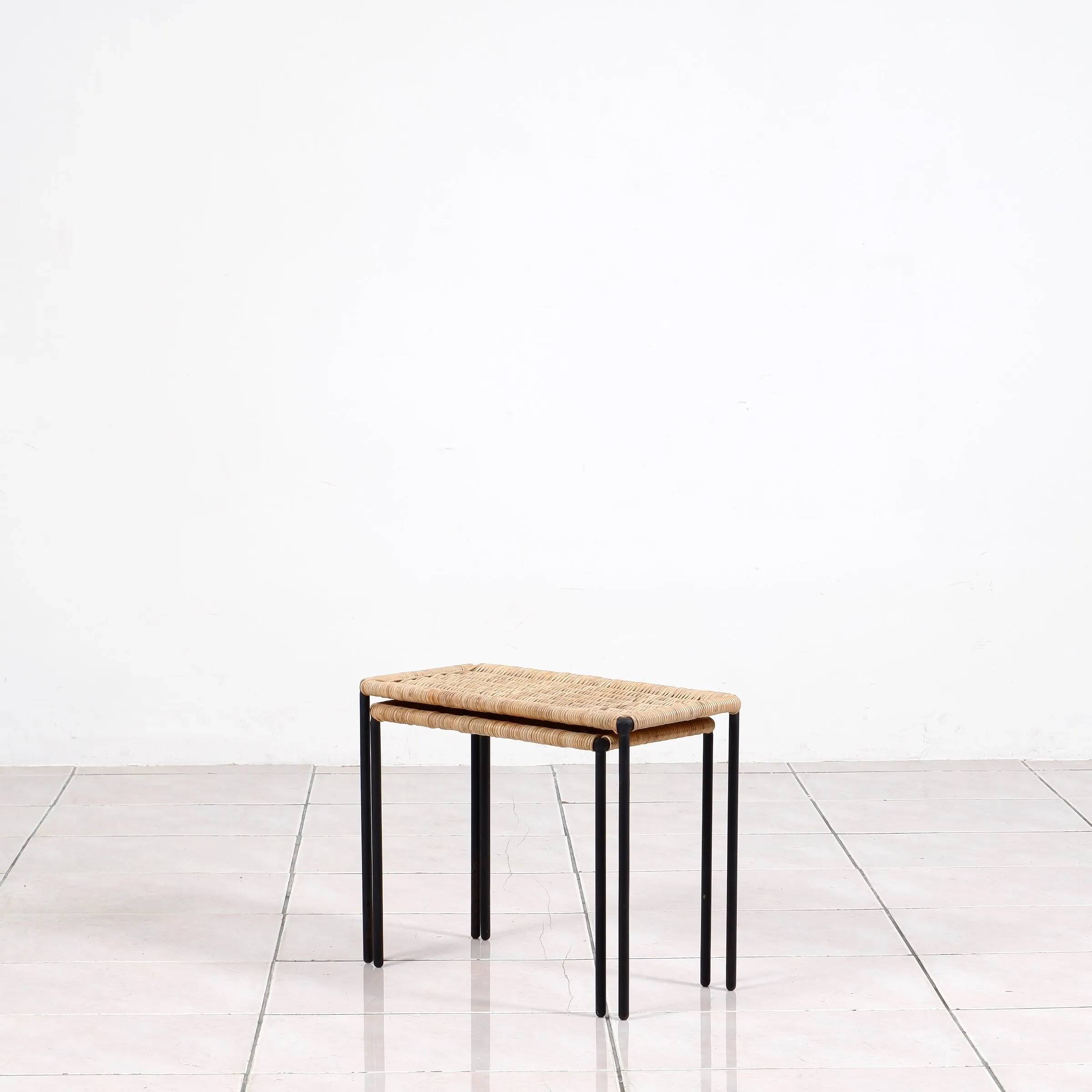 Nesting tables in metal / rattan by Carl Auböck