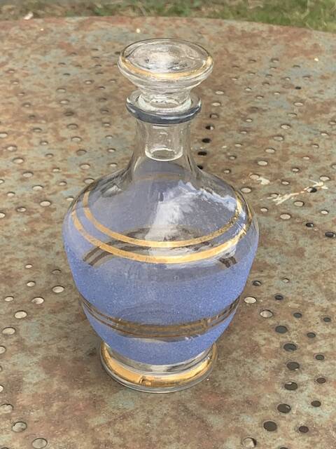 Blue granite glass carafe with vintage gold trim.