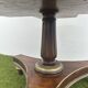 Old round and revolving wooden and brass library