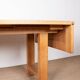 Large extendable dining table in solid oak by Guillerme and Chambron.