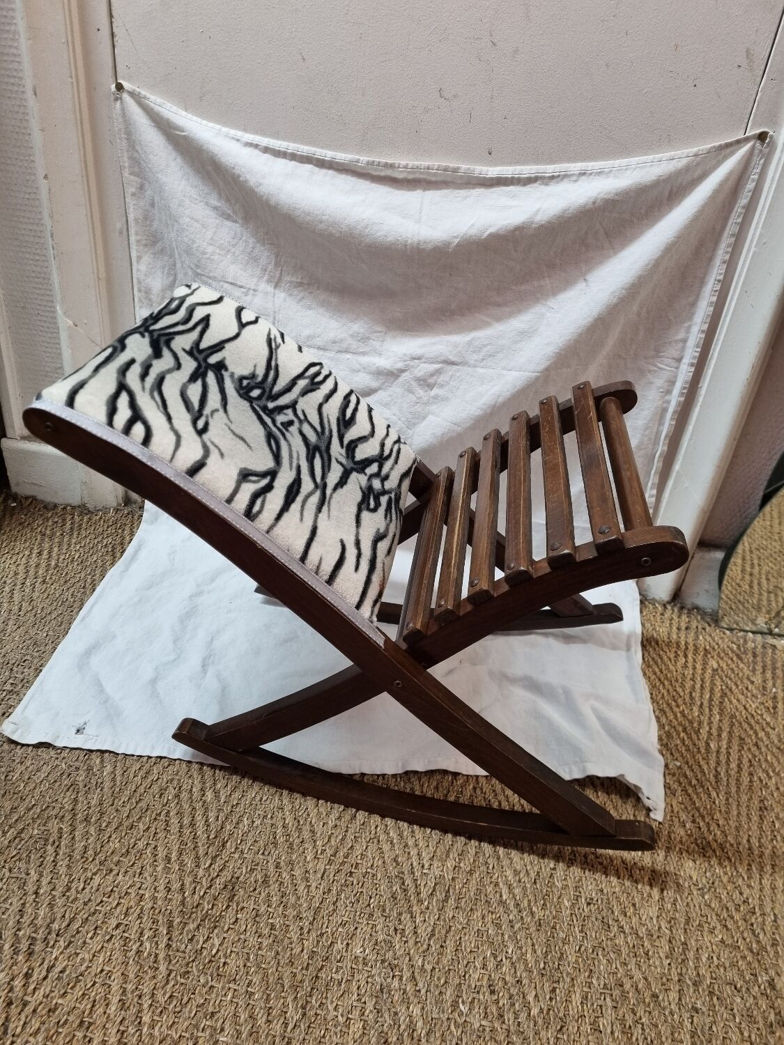 Zebra rocking footrest from 1960