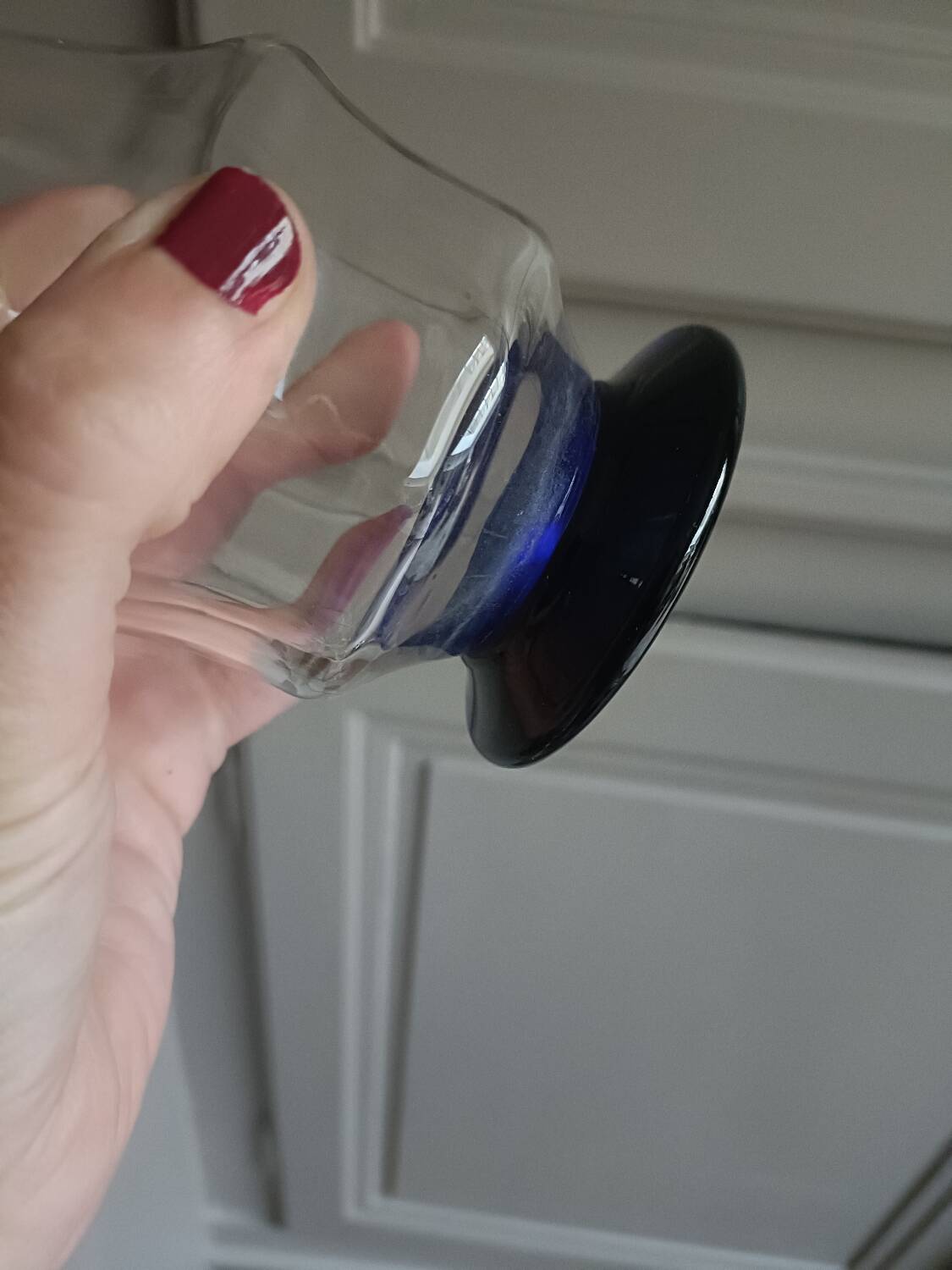 White and blue blown glass carafe