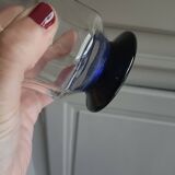 White and blue blown glass carafe